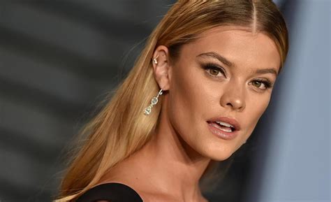 Sports Illustrated Swimsuit model Nina Agdal poses completely。